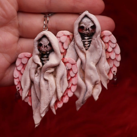 White reaper earrings