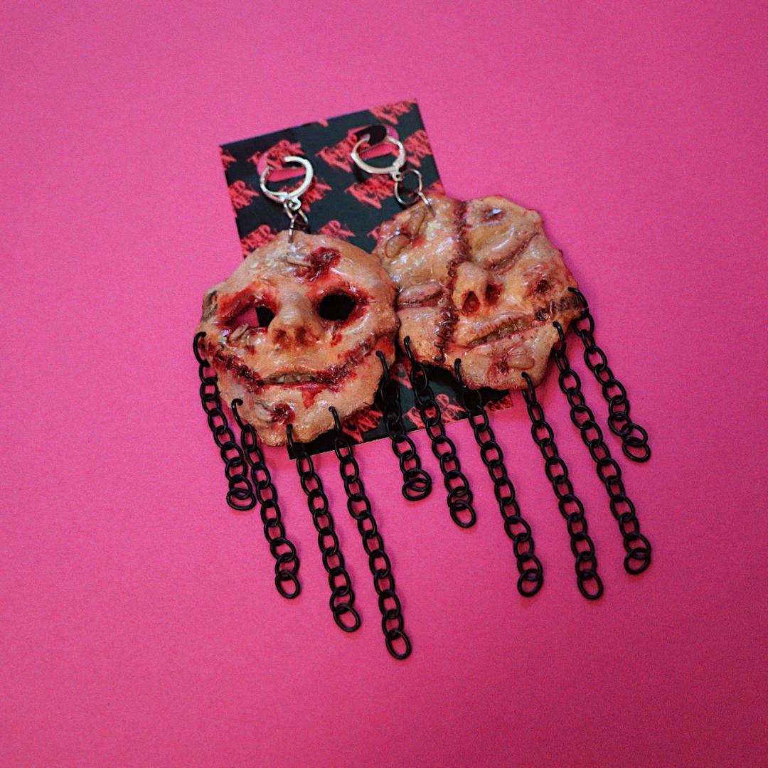 Skinned face  earrings